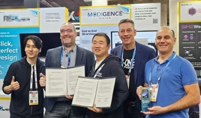 CEO Kim Dae-hee and CGO Haksoo Jung with MountAIn partners holding signed MoUs in front of the ModigenceVision booth at CES 2026